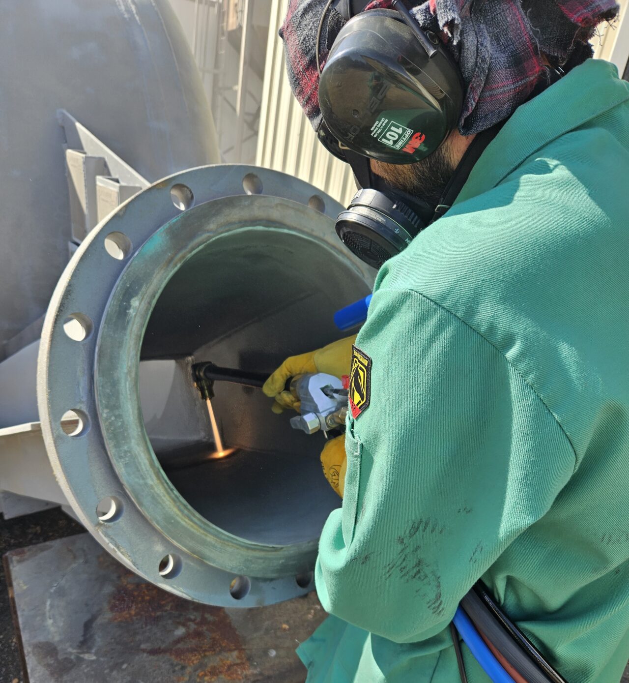 History and Benefits of Robots in Thermal Spray Coating Applications